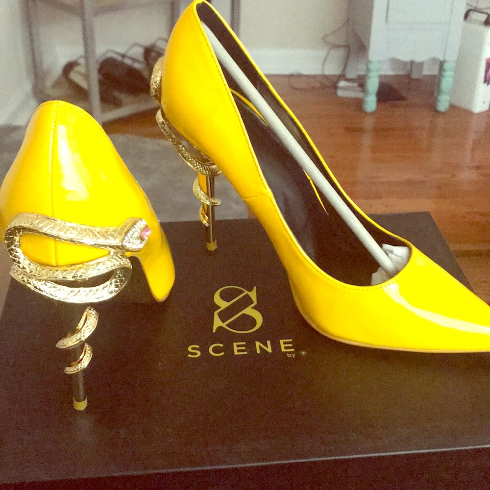 Yellow patent leather stilettos with snake
